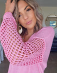 Pull ajouré rose