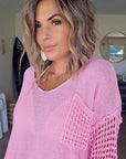 Pull ajouré rose