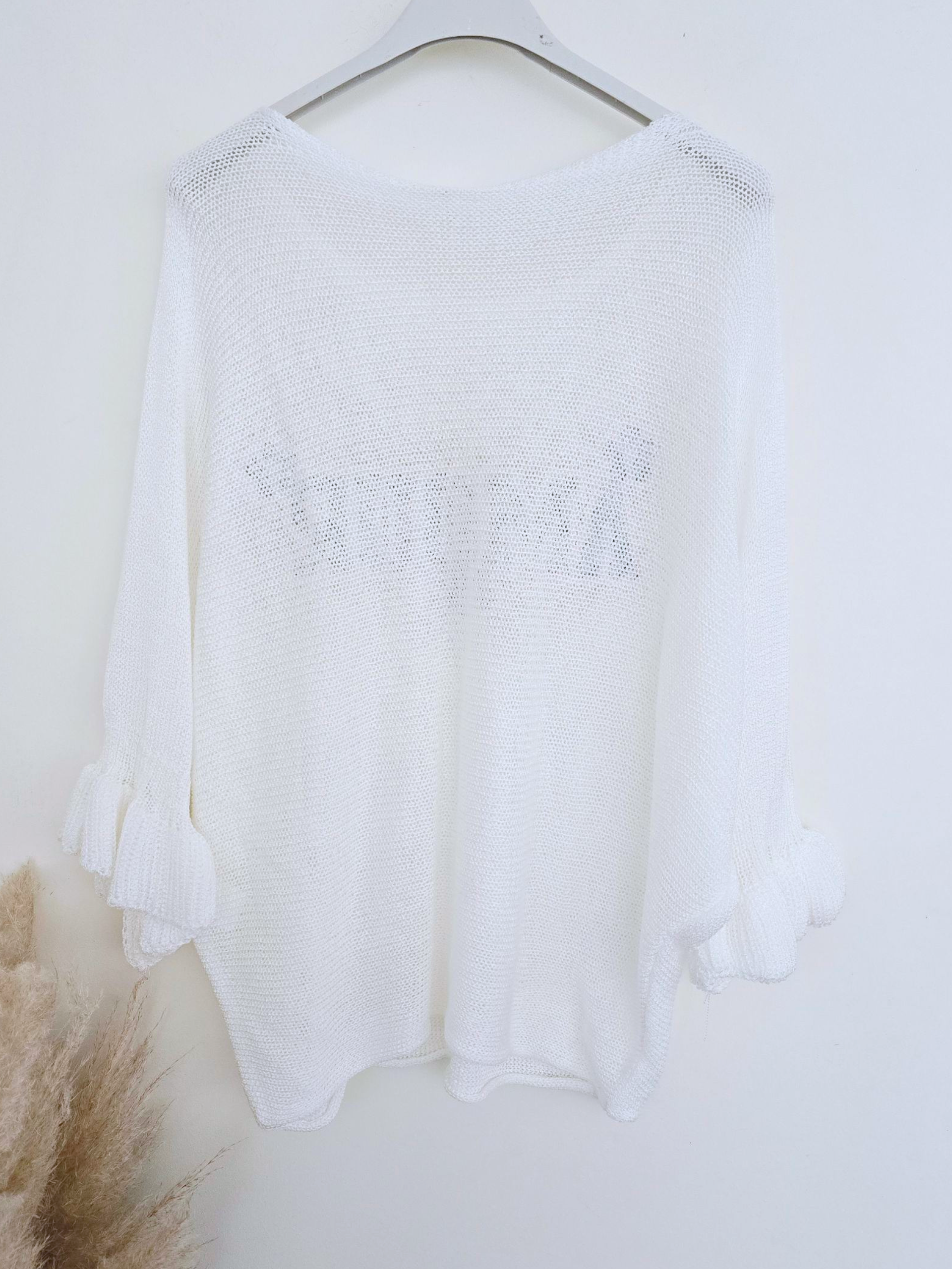 Pull ajouré amour