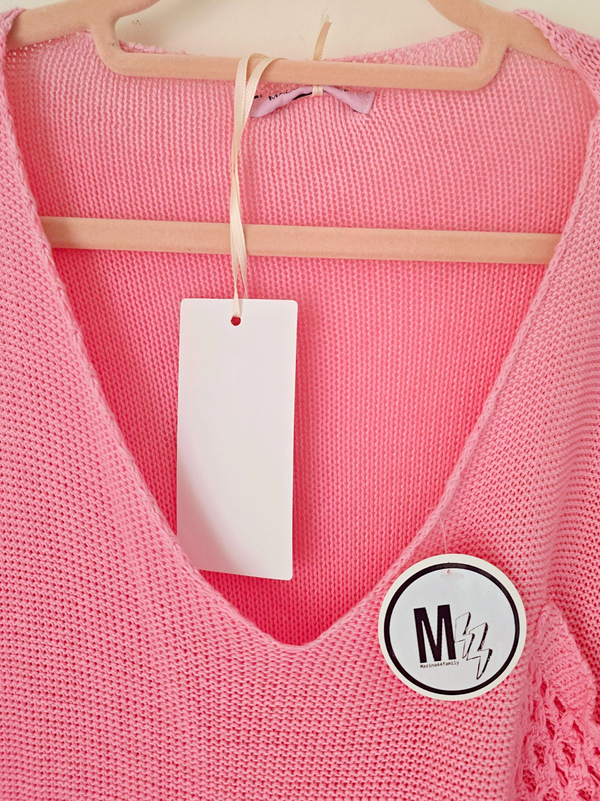 Pull ajouré rose
