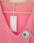 Pull ajouré rose