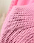 Pull ajouré rose