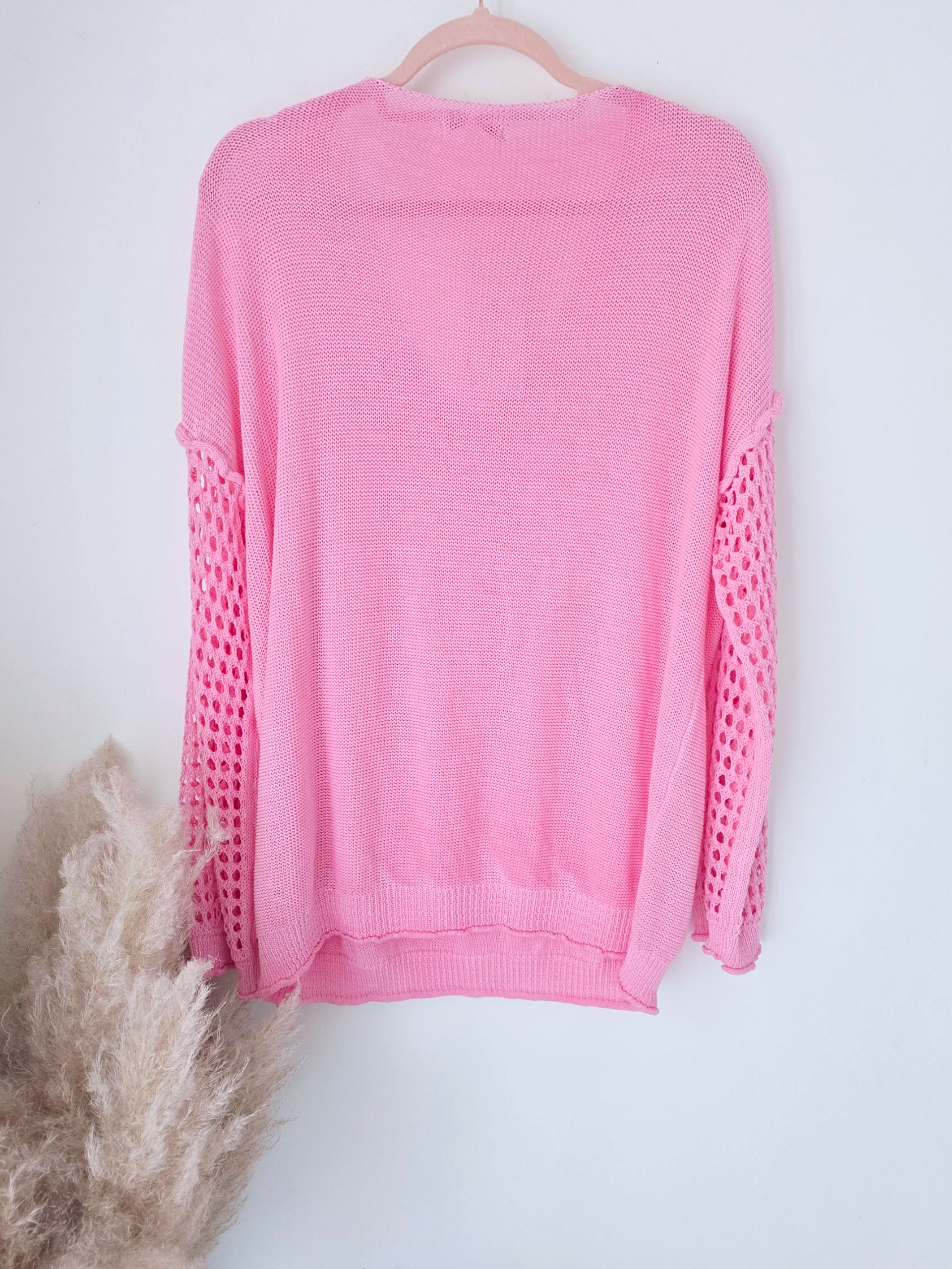 Pull ajouré rose
