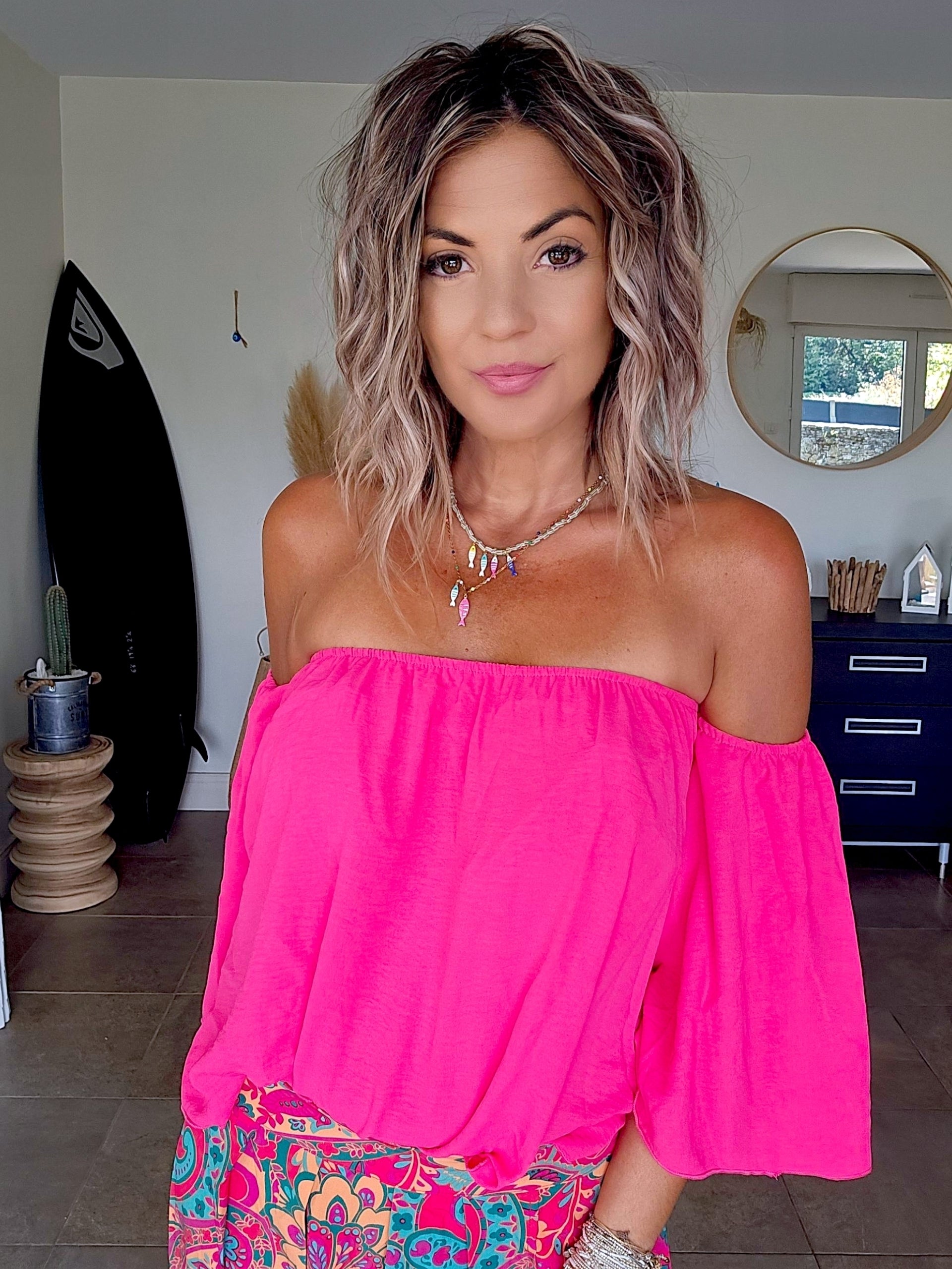 Blouse fuchsia épaules dénudées