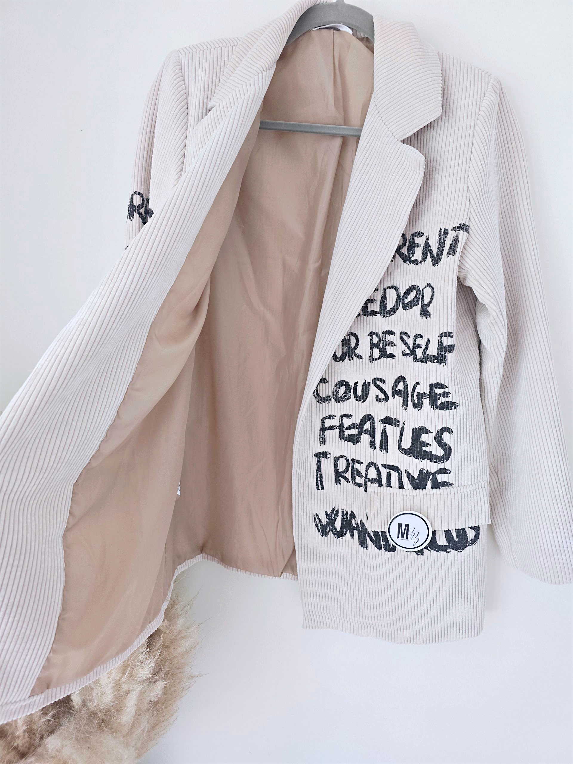 Veste velours écru à tags