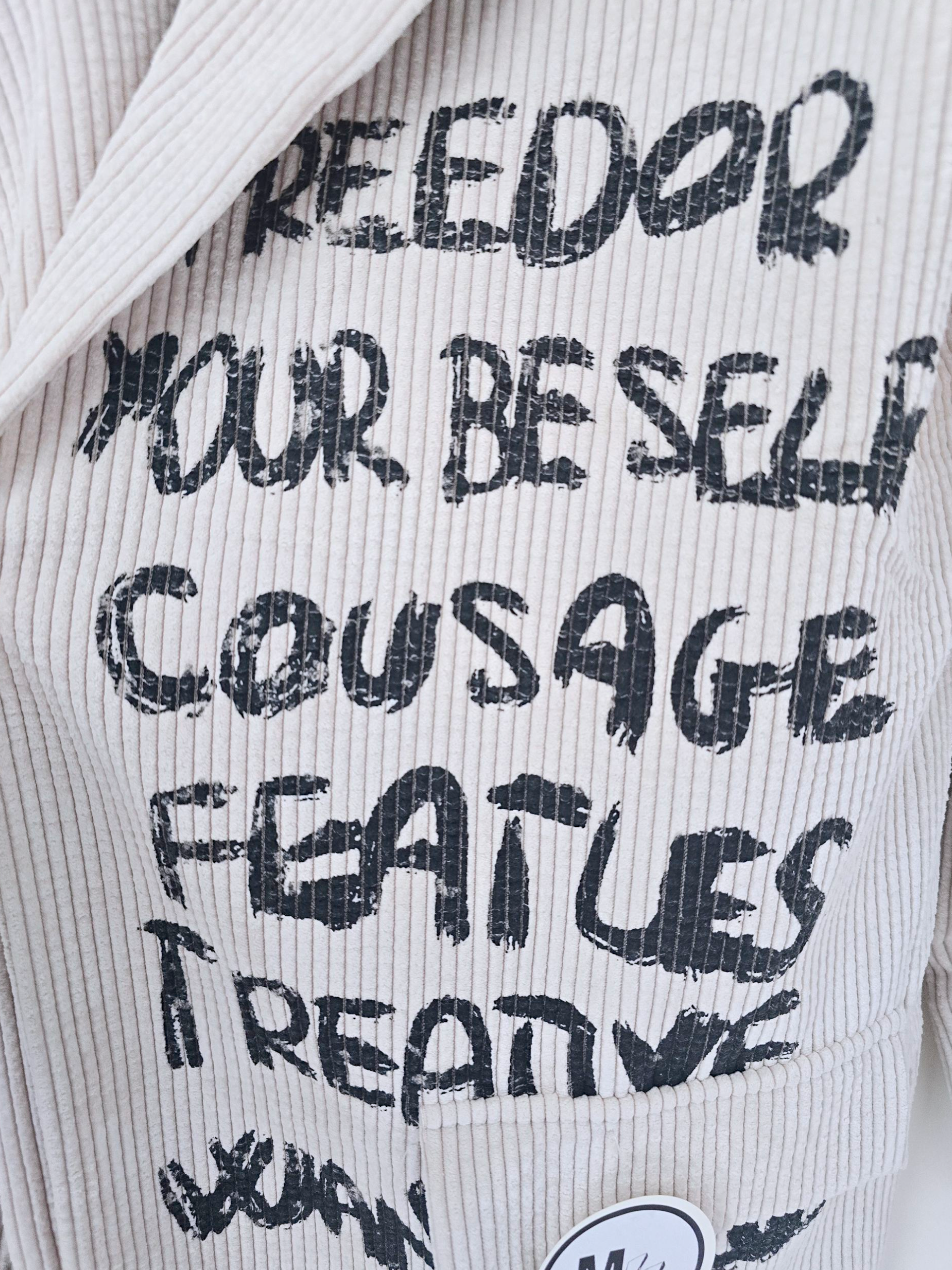 Veste velours écru à tags