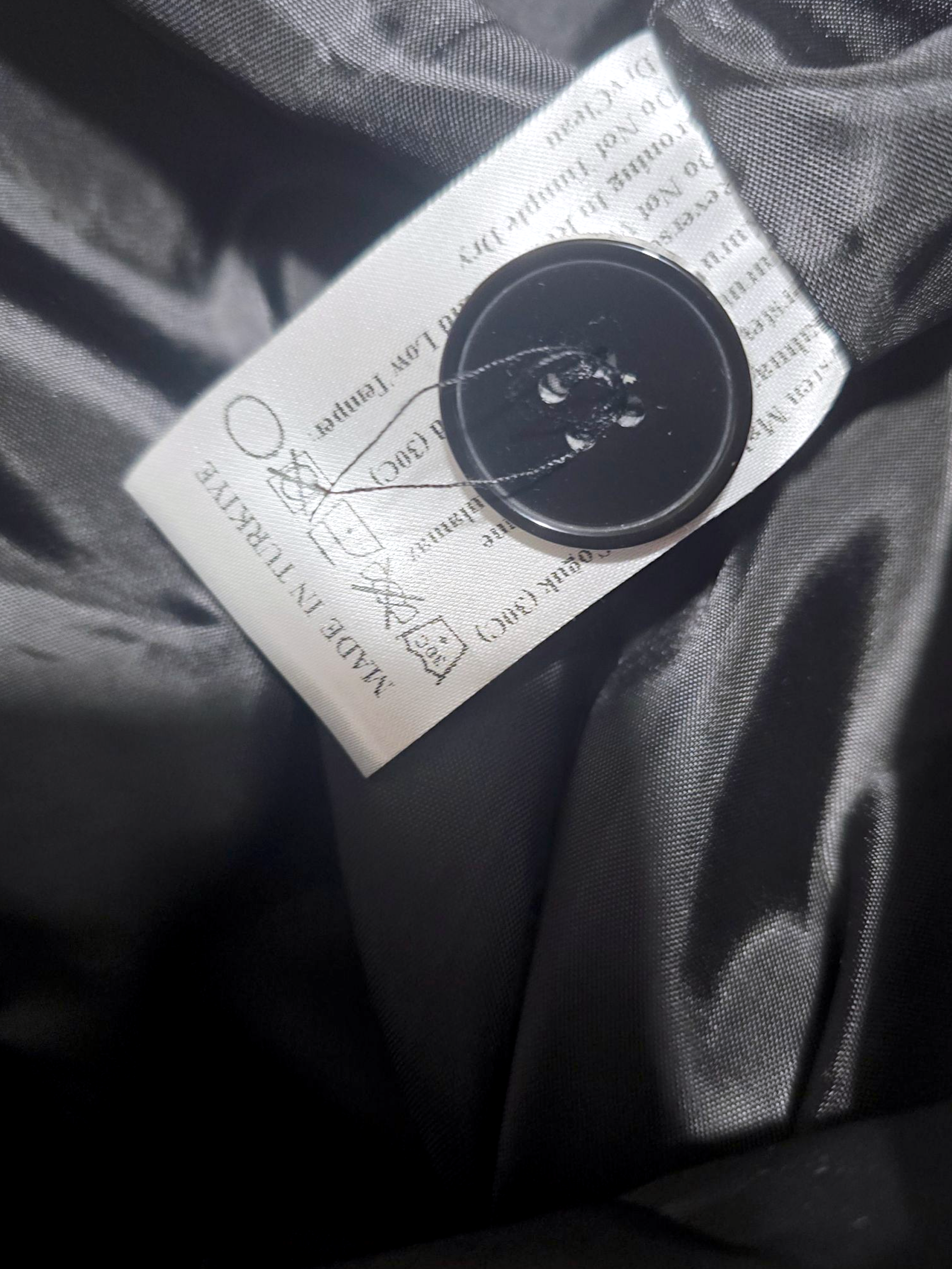 Veste noire à tags smiley