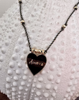 Collier coeur noir