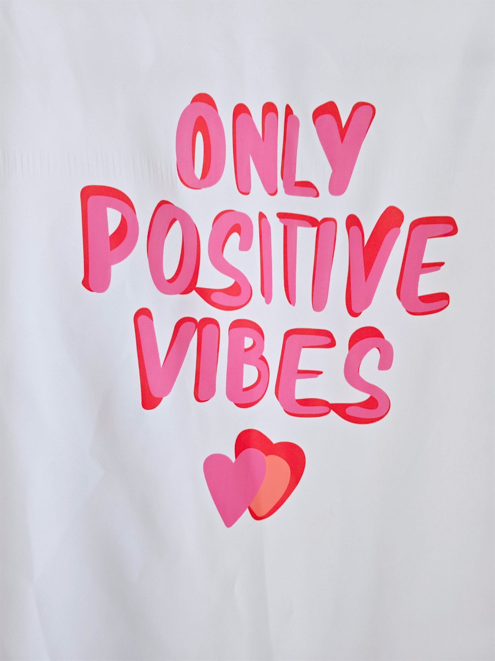 Blazer blanc à tags roses