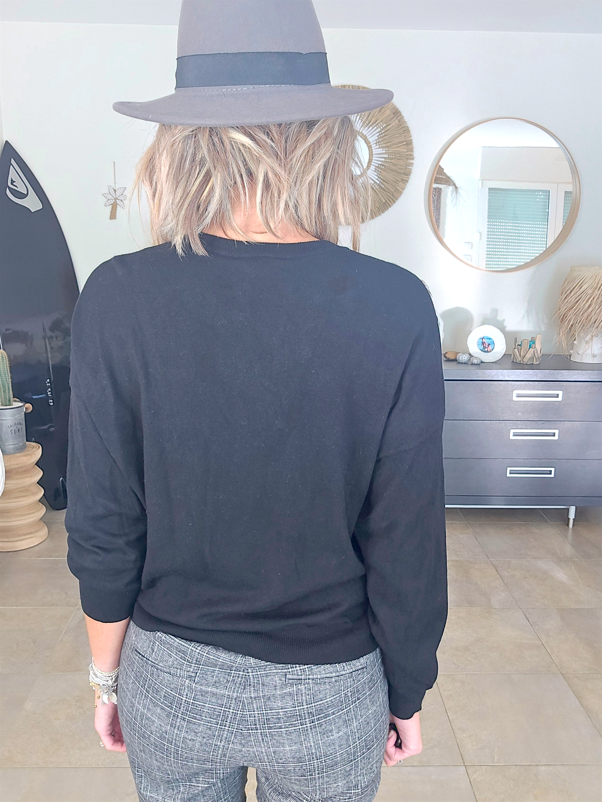 Pull noir éclairs sequins