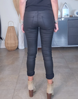 Pantalon slim noir huilé
