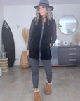 Manteau teddy noir manches cuir et peau retournée