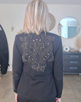 Veste cintrée noire cloutée
