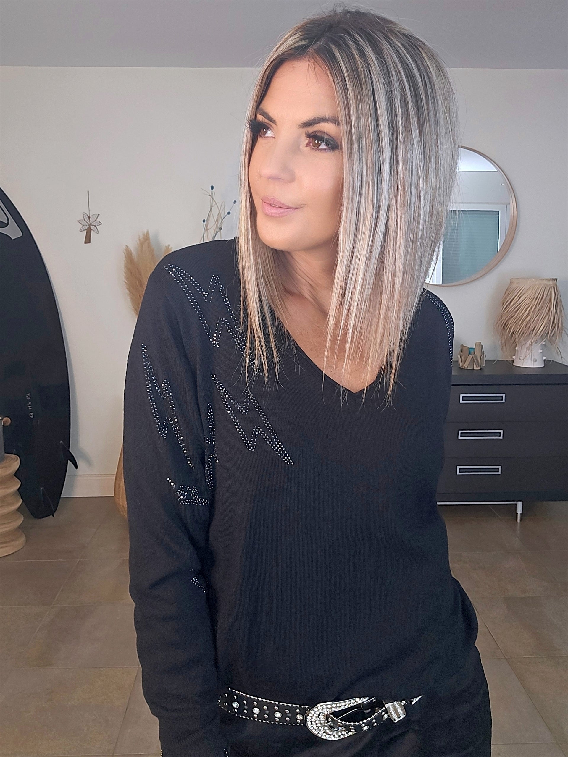 Pull noir éclairs strass