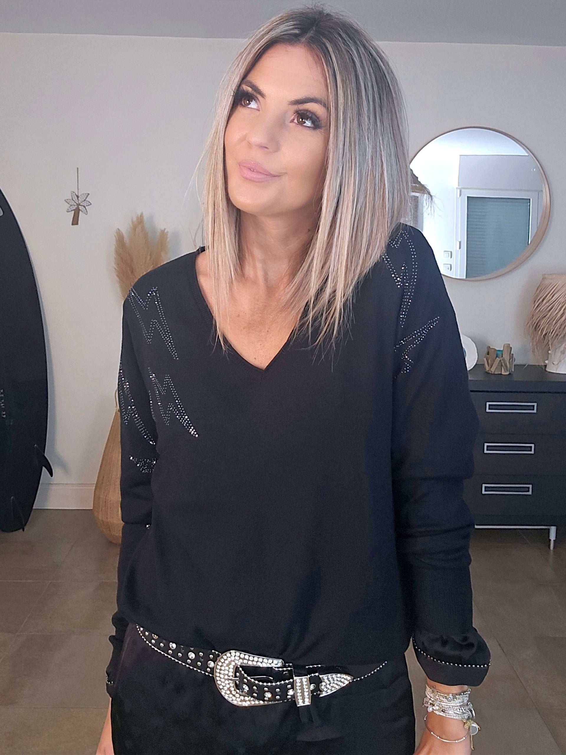 Pull noir éclairs strass