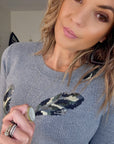 Pull gris plumes camouflage - 𝐌𝐚𝐫𝐢𝐧𝐚𝟒𝟒𝐟𝐚𝐦𝐢𝐥𝐲