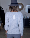 Pull gris chaud à maille douce