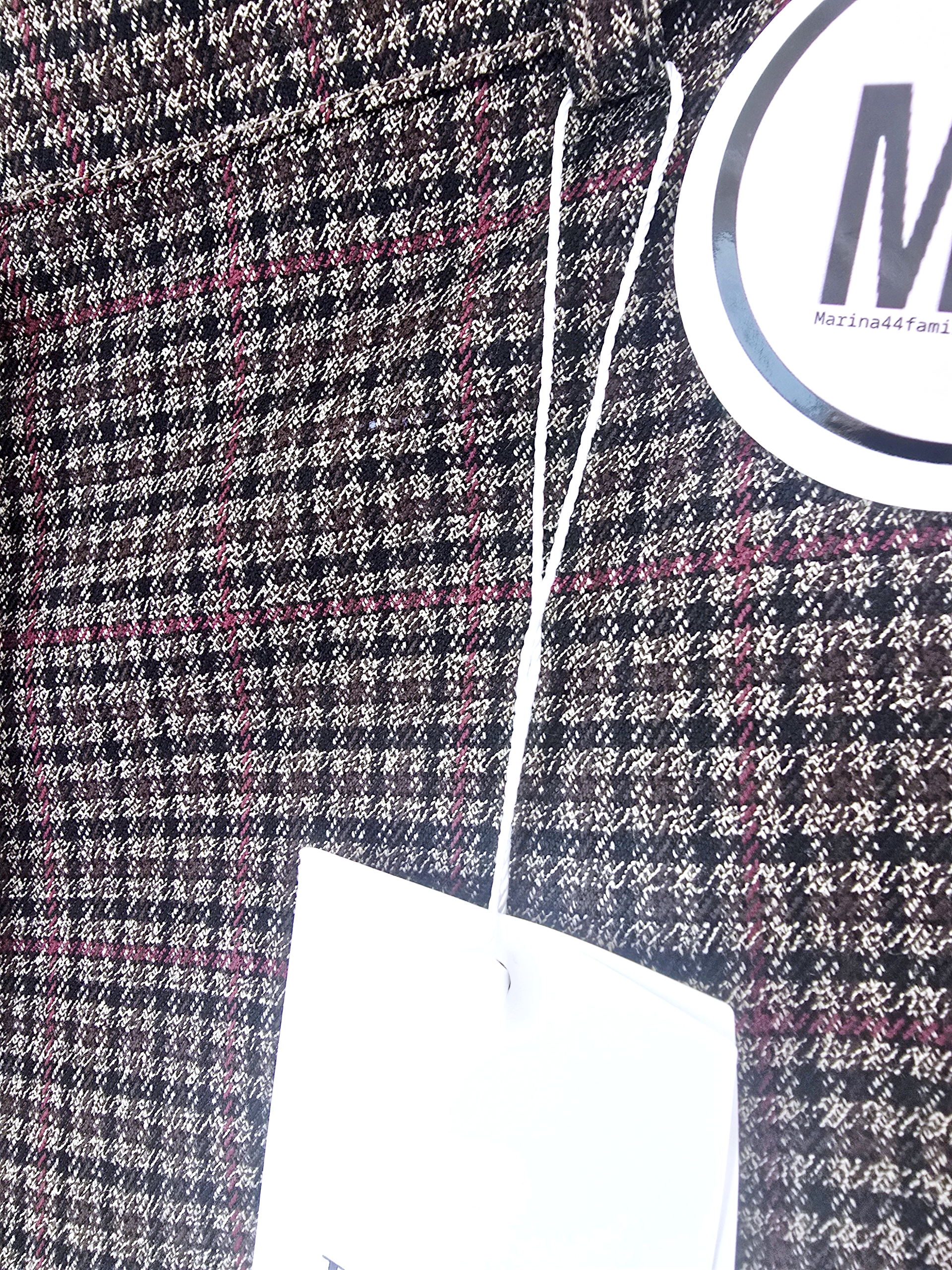 Pantalon marron imprimé pied-de-poule.