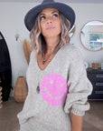 Pull beige smiley rose
