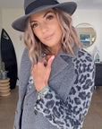 Manteau chevron et léopard gris