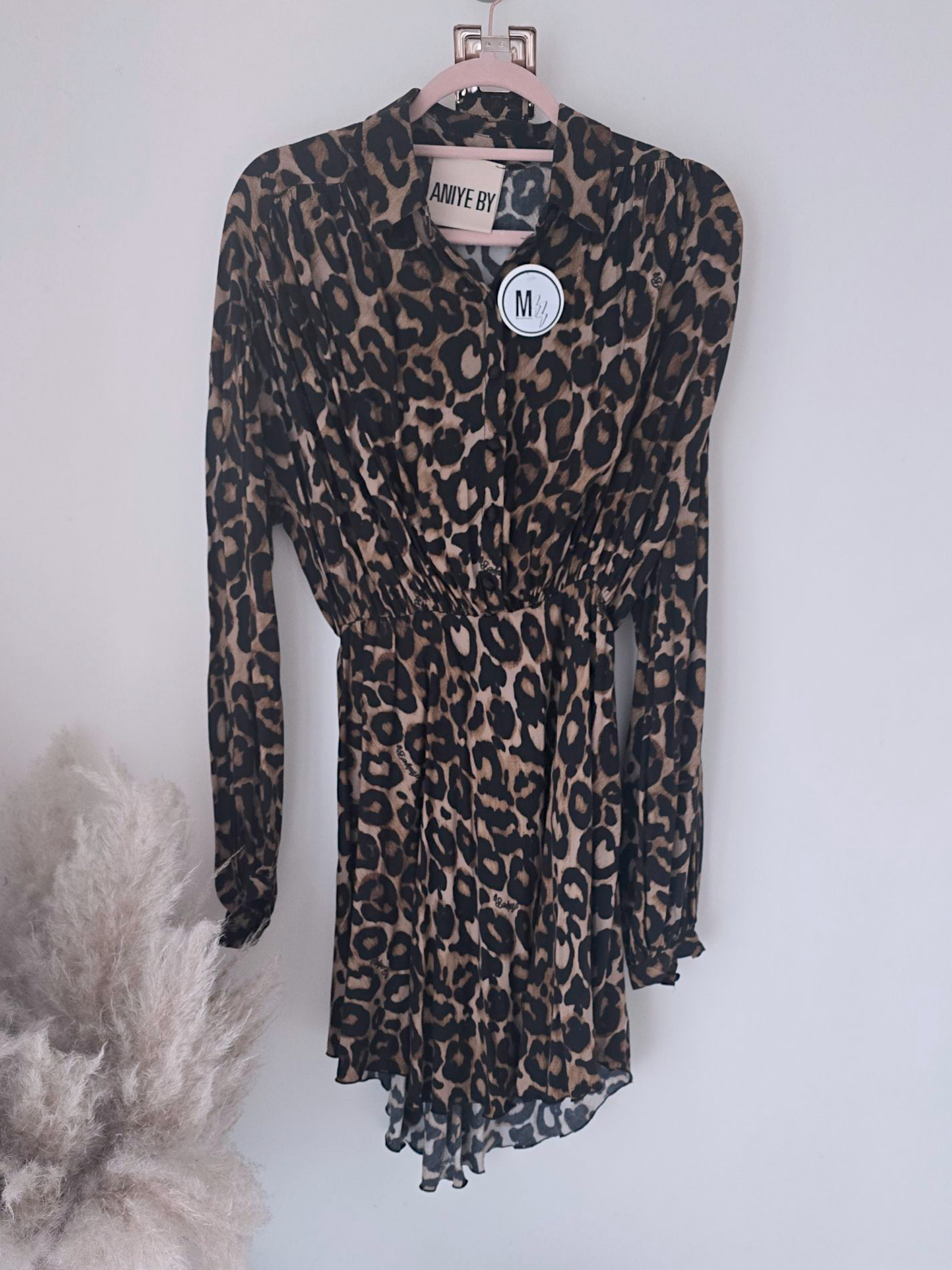 Robe léopard avec ceinture