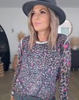 Pull léopard rose vif