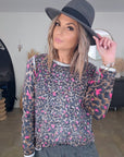 Pull léopard rose vif