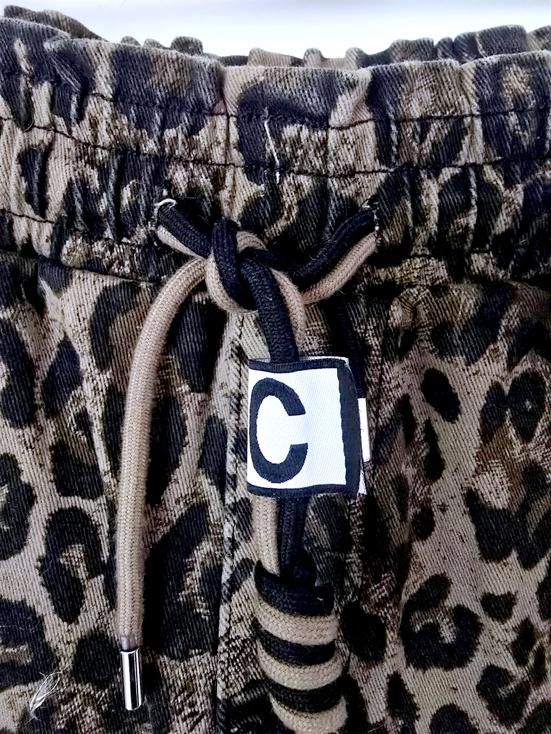 Pantalon jeeging léopard kaki