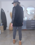 Manteau teddy noir manches cuir et peau retournée