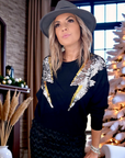 Pull noir éclairs sequins