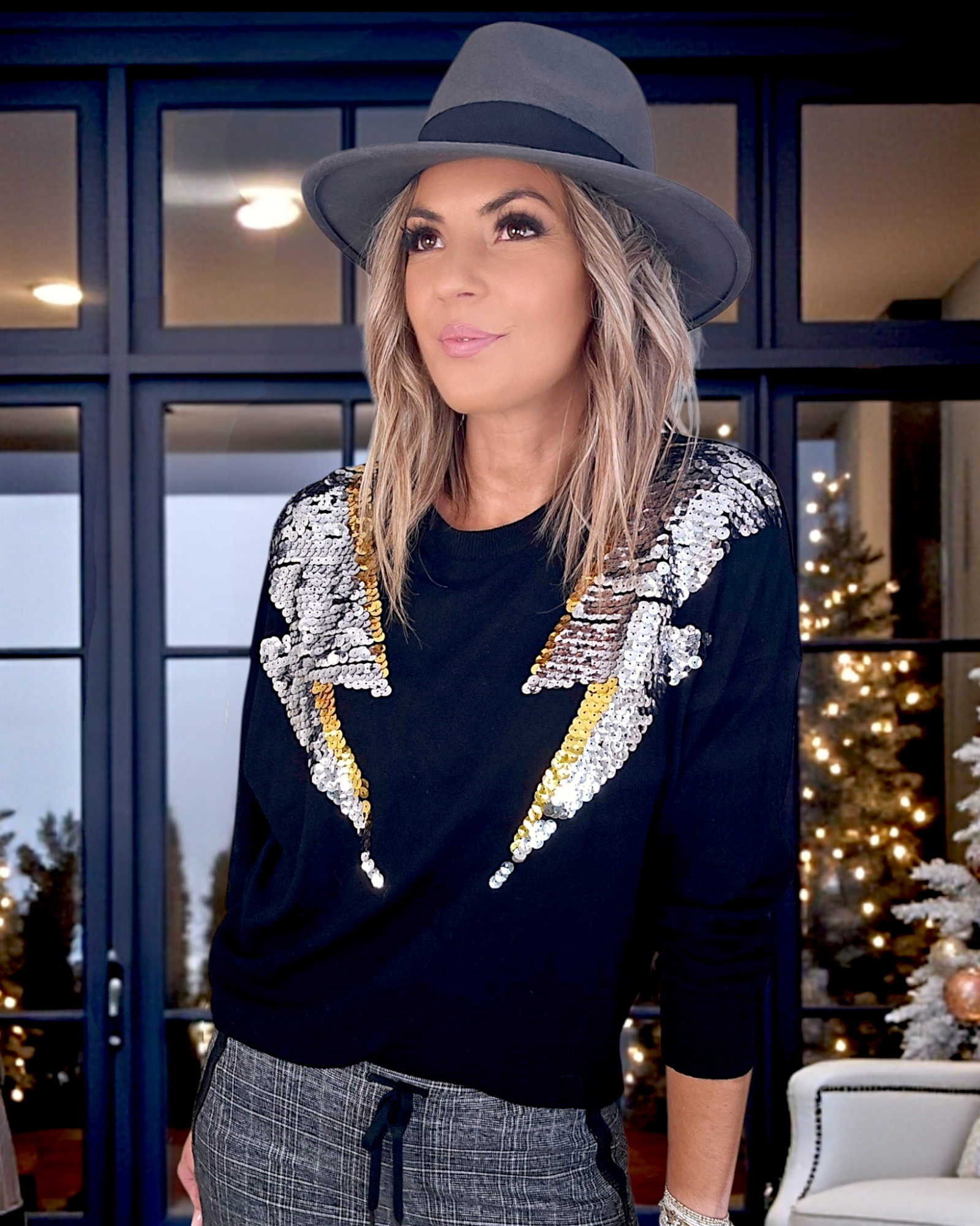 Pull noir éclairs sequins