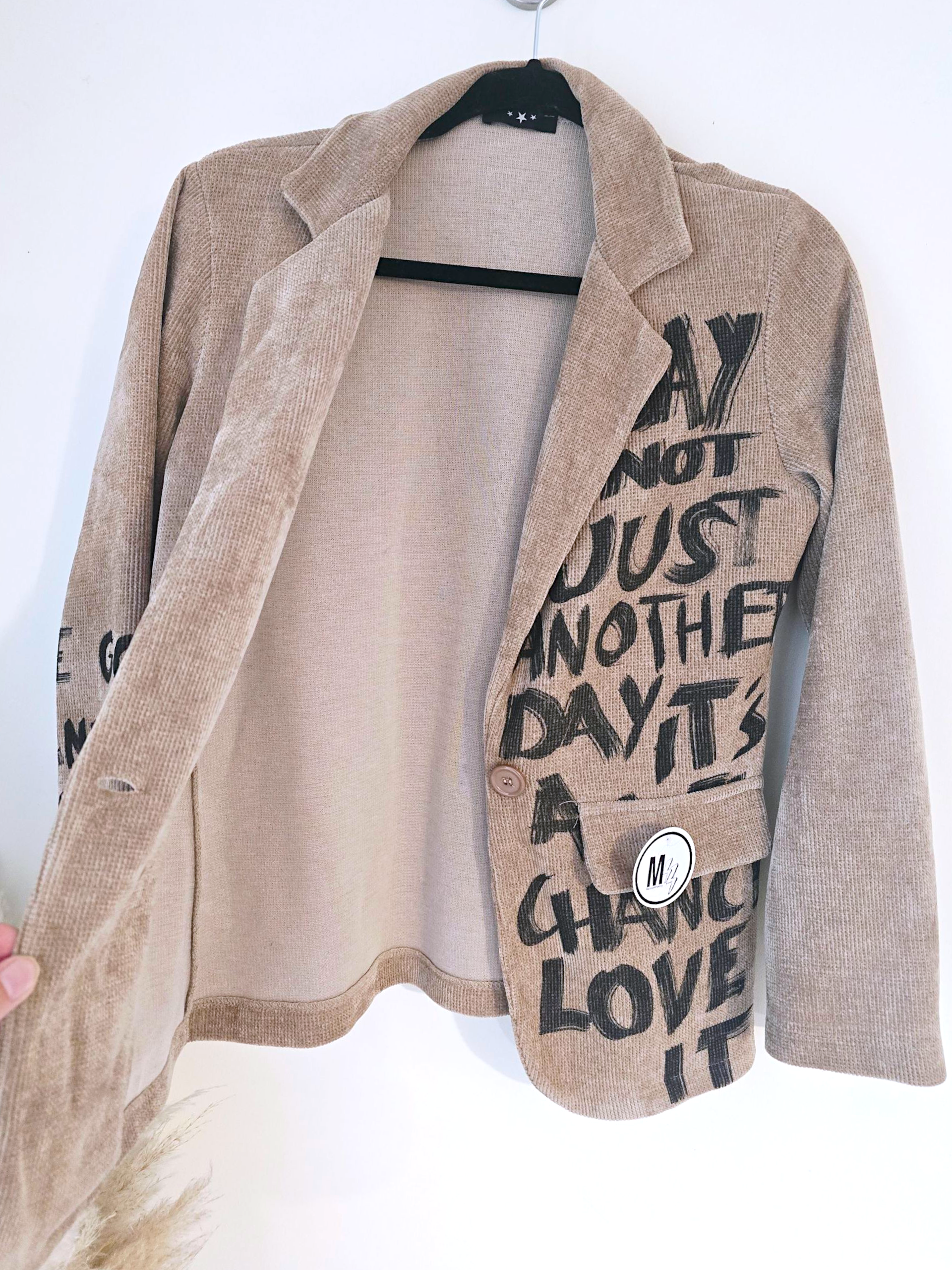 Veste velours ras tags