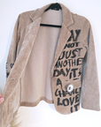 Veste velours ras tags