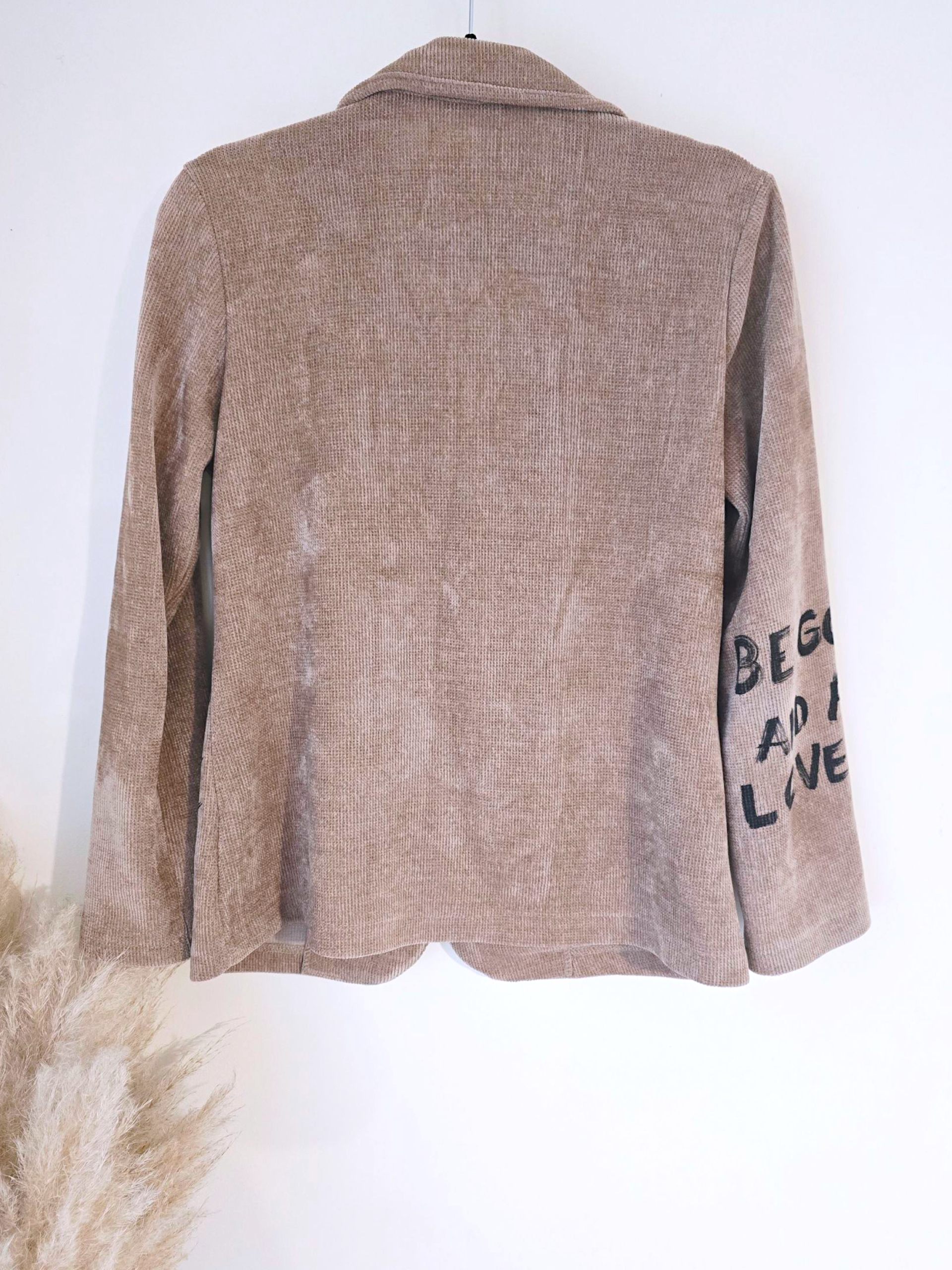 Veste velours ras tags