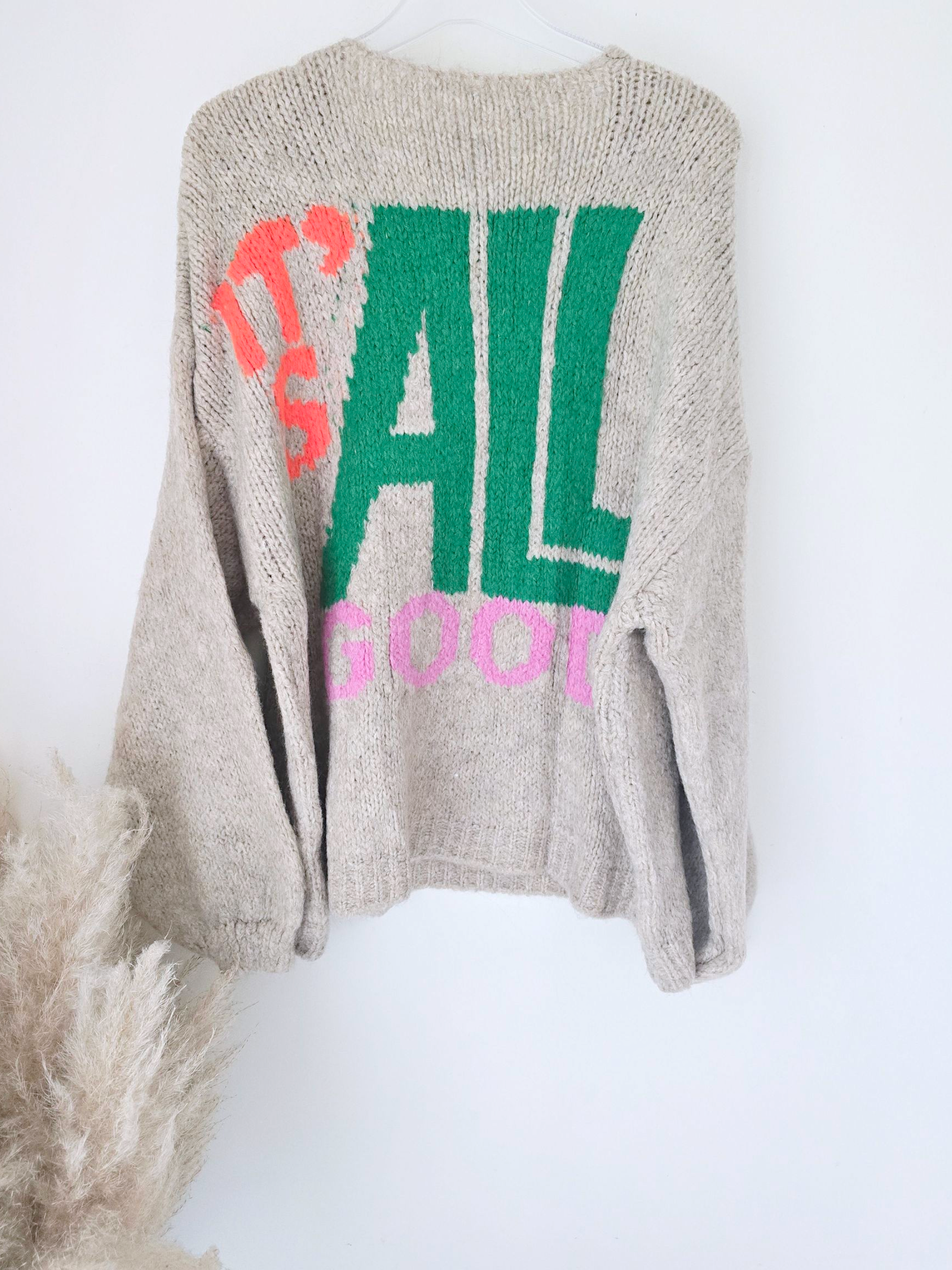 Pull beige smiley rose