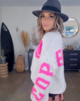 Cardigan smiley fuchsia