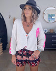 Cardigan smiley fuchsia