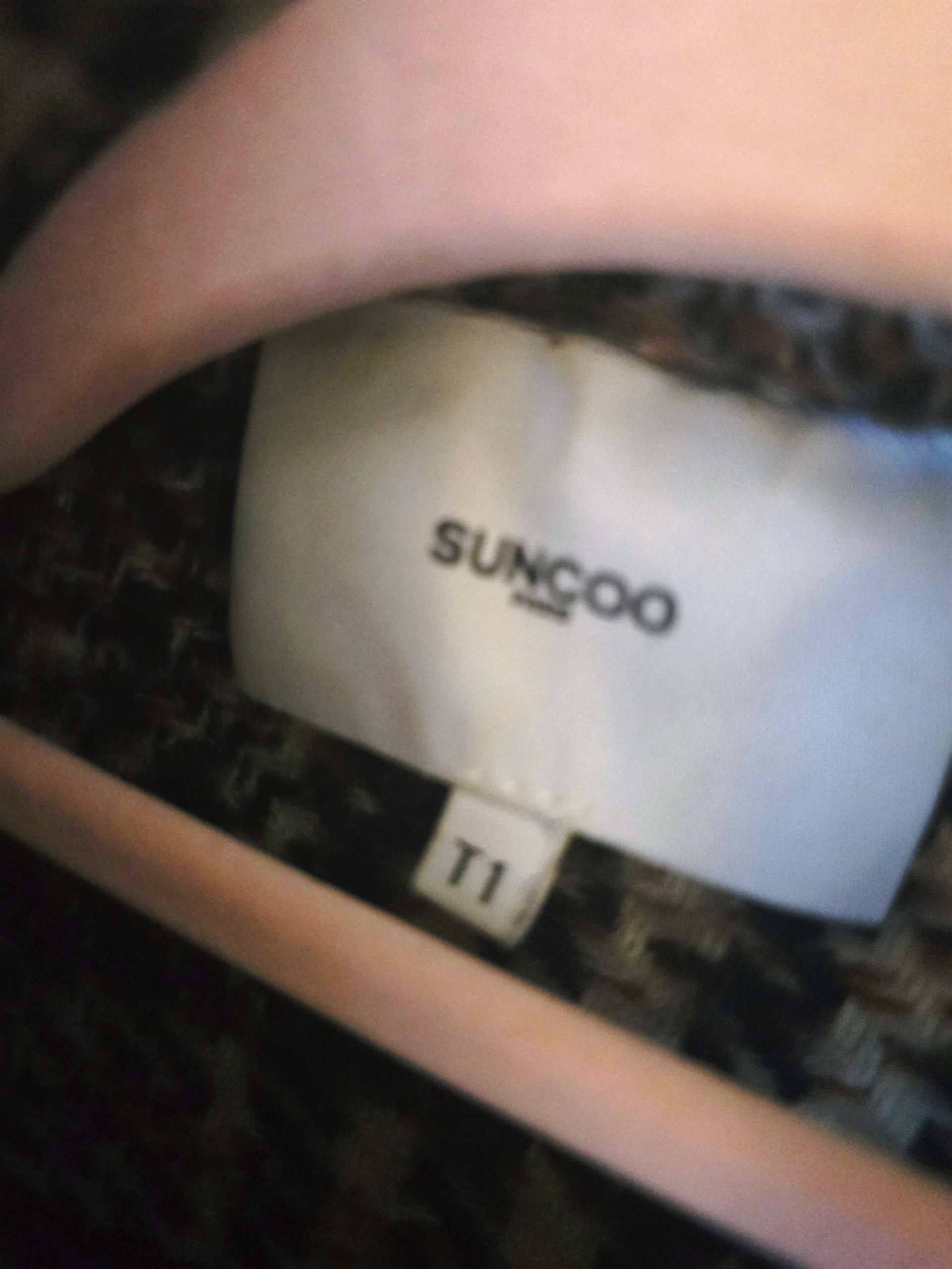 Veste Surchemise tweed à carreaux.