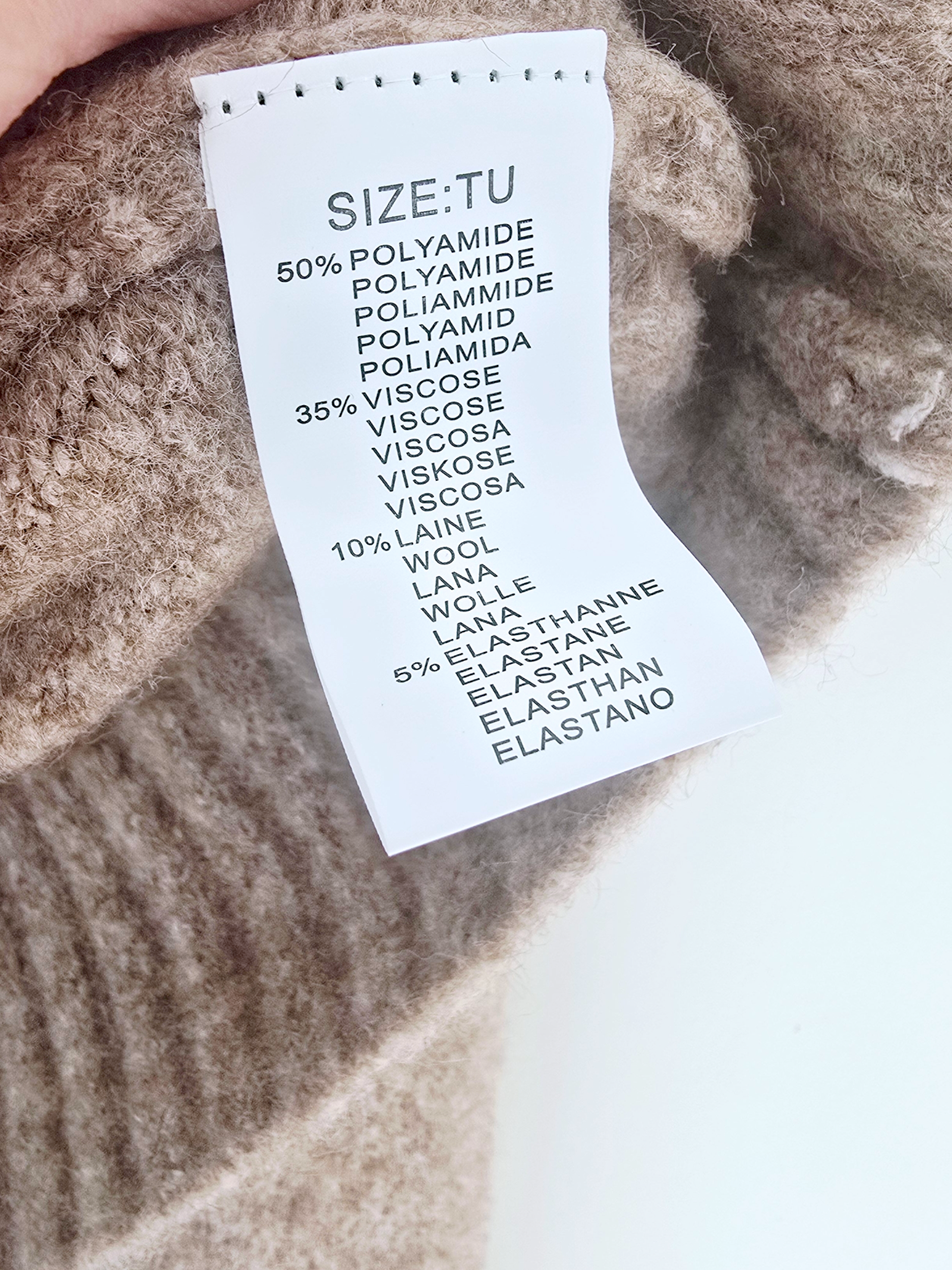 Cardigan beige chiné à maille chaude coeur léopard.