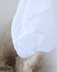 Chemise blanche à volants