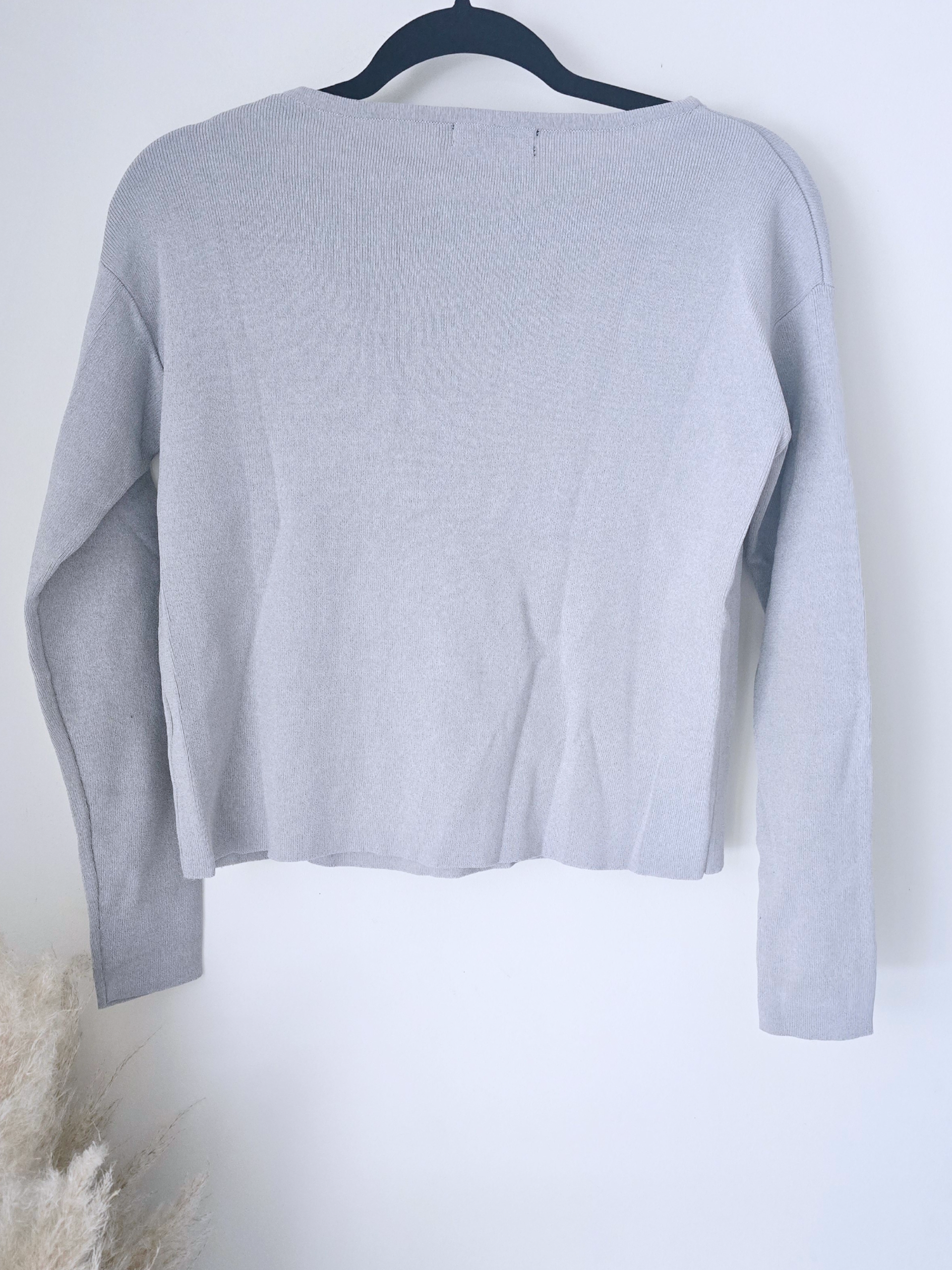 Pull gris écussons