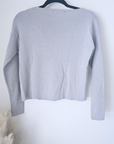 Pull gris écussons