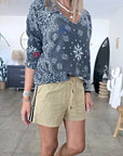 Short beige à bandes latérales