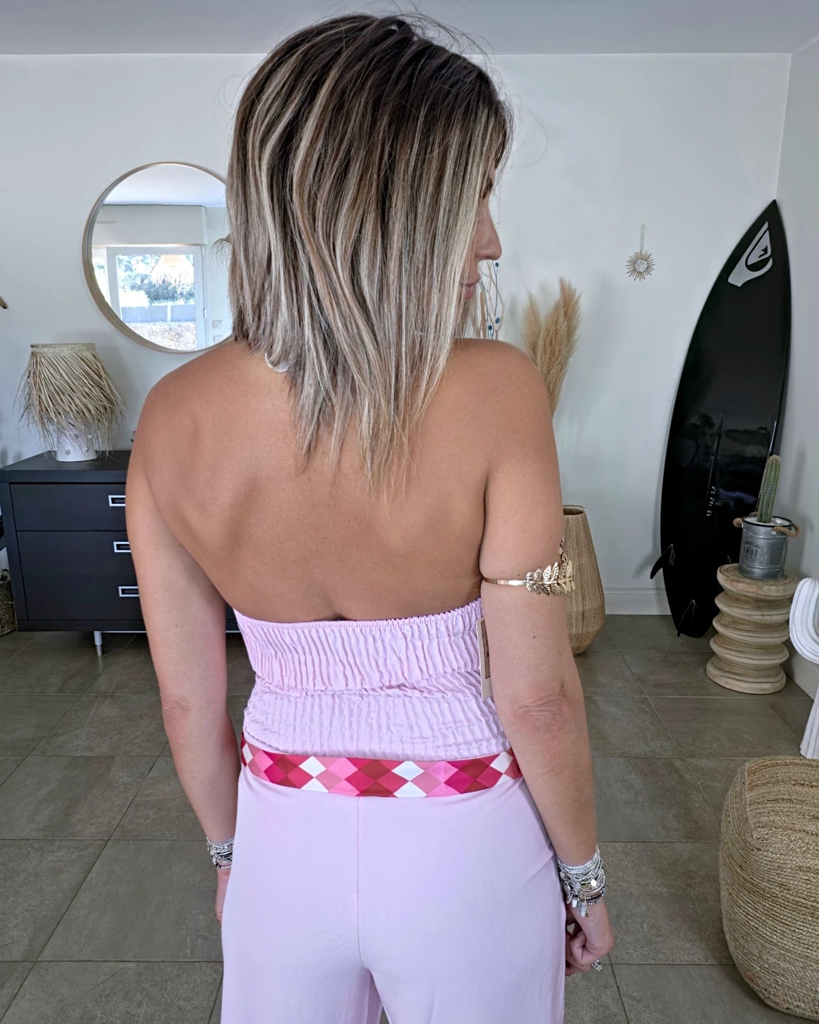 Combinaison rose à dos nu