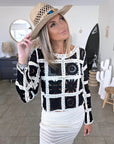 Pull ajouré noir et écru