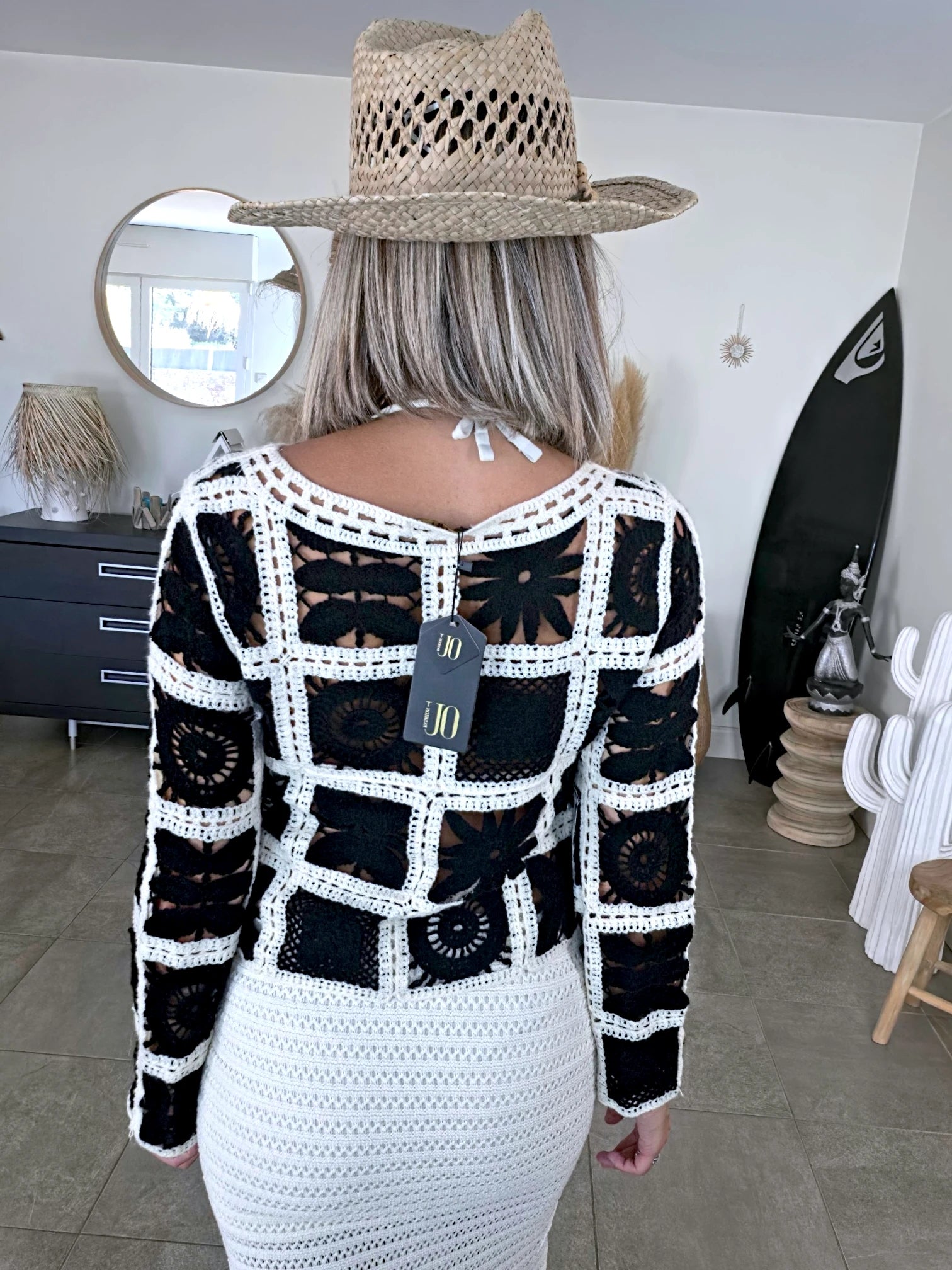 Pull ajouré noir et écru
