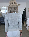 Cardigan en maille écru