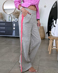 Pantalon taupe à bandes fluo