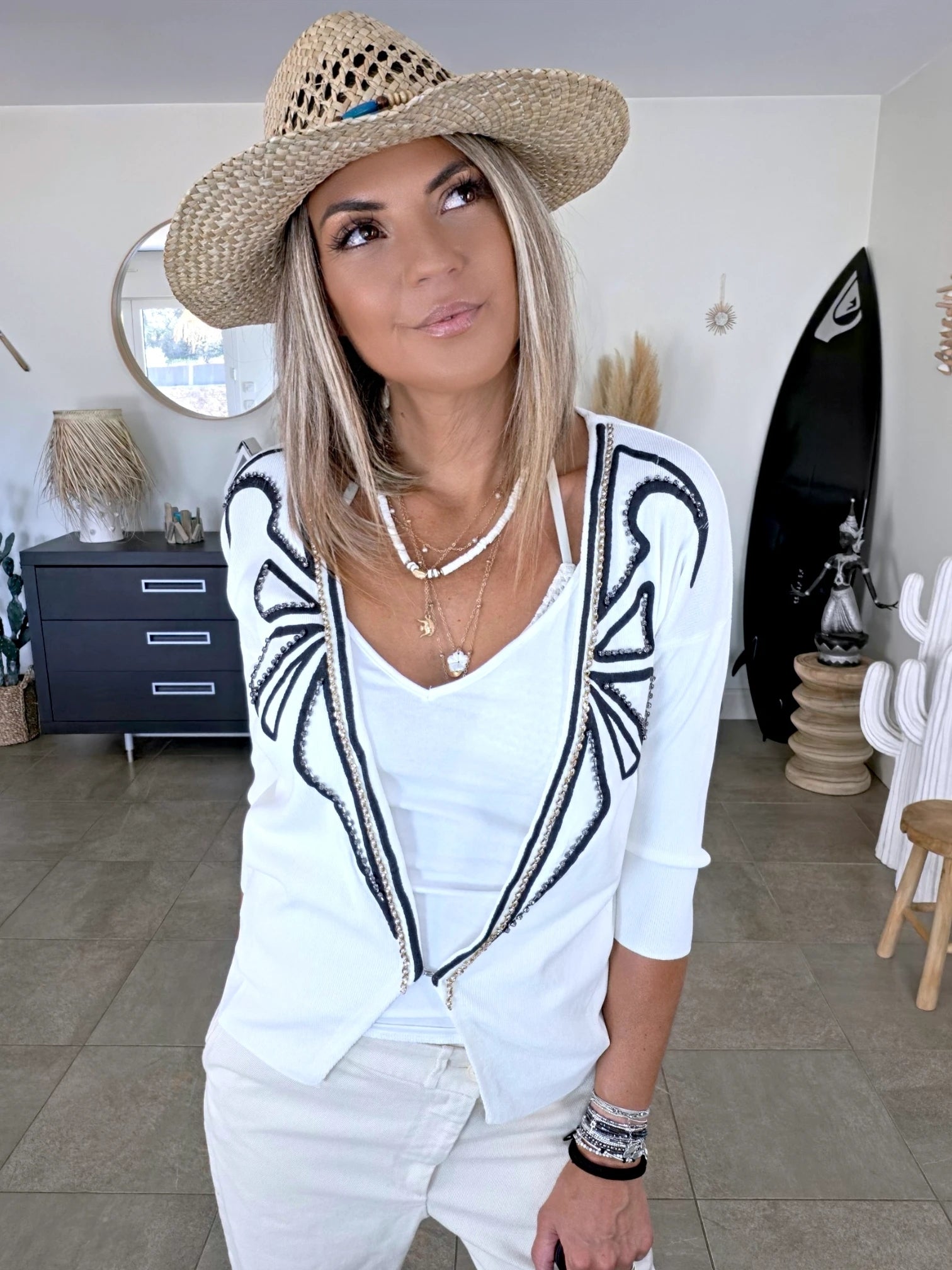 Cardigan blanc à encolure en V profonde