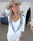 Cardigan blanc à encolure en V profonde